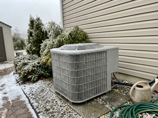 Heat pump coil covered in ice after freezing rain